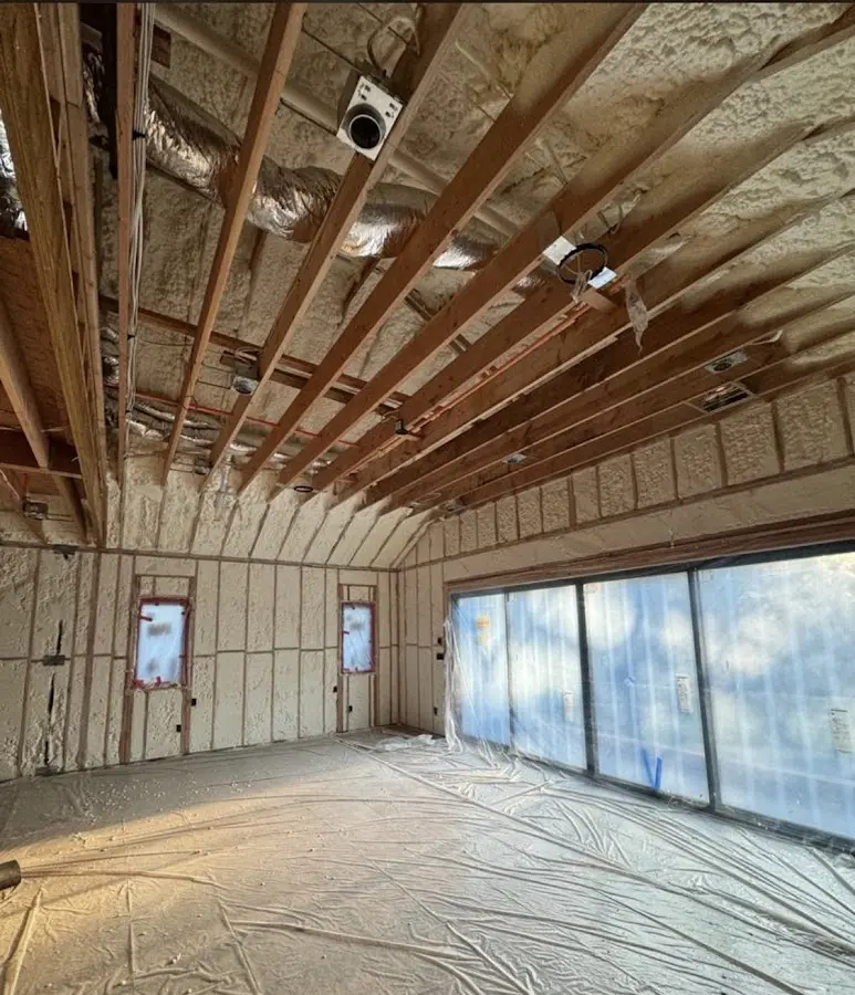 Interior walls and ceiling insulated with spray foam during new construction in West Milford